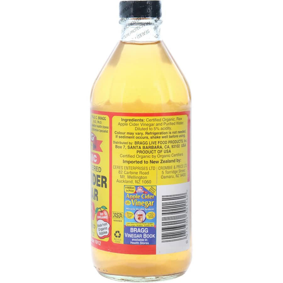 Bragg Organic Apple Cider Vinegar, made from raw apples, packed with 'mother' for health & flavor enhancement in cooking.