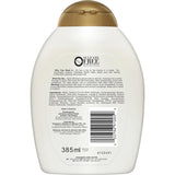 Bottle of OGX Coconut Milk Shampoo featuring tropical ingredients for nourished, hydrated, and healthy hair.