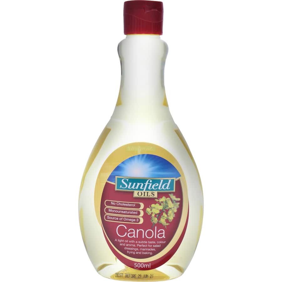 Sunfield Canola Oil bottle with easy squirt lid, a premium, cholesterol-free oil ideal for cooking and salad dressings.