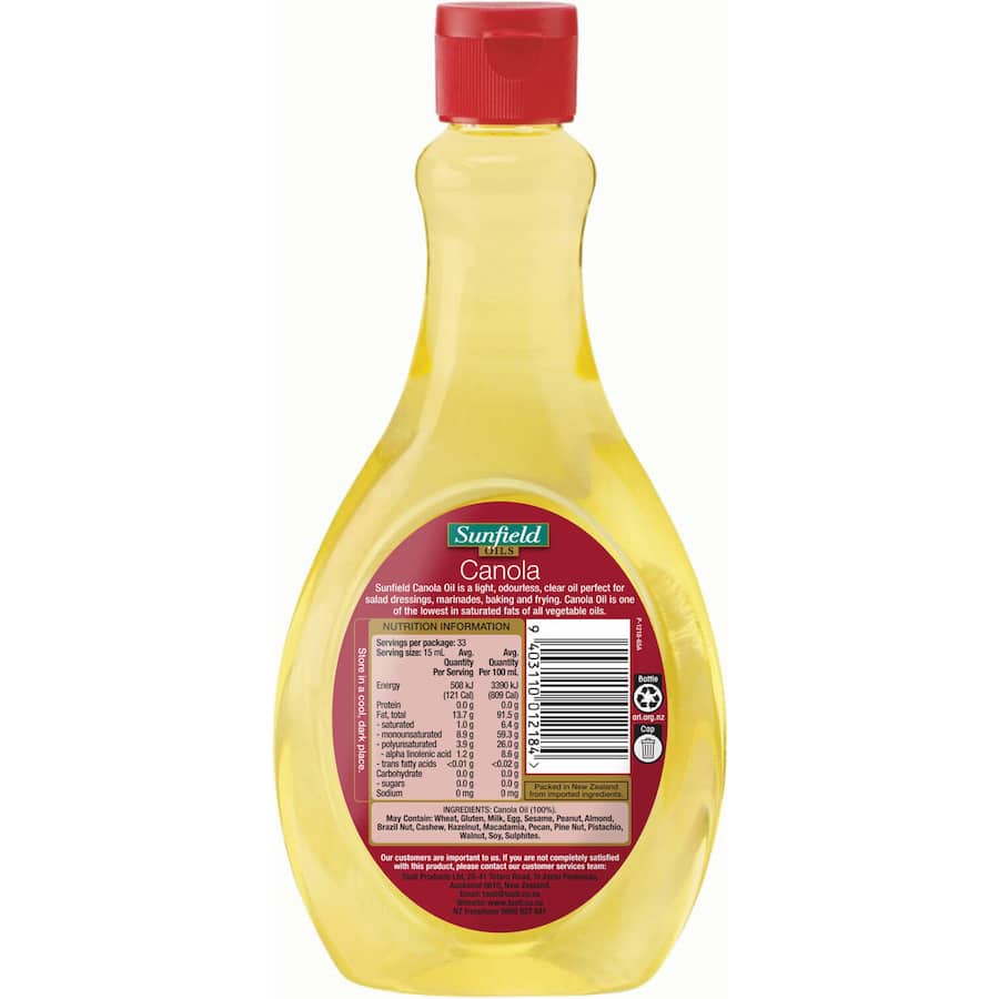 Sunfield Canola Oil bottle showcasing its light color, ideal for healthy cooking, dressings, and frying with easy squirt lid.