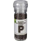 Whole black peppercorns in a grinder, ideal for enhancing flavors in gourmet meals without artificial additives.