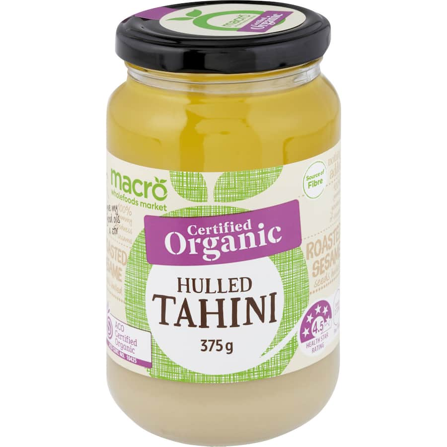 Creamy Macro Organic Hulled Tahini made from premium organic sesame seeds, perfect for dips and dressings, free from additives.