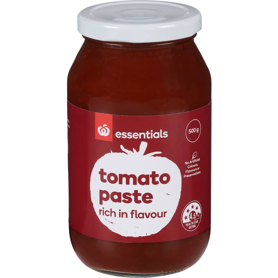 Rich and flavorful 500g Woolworths Essentials tomato paste, ideal for pasta sauces and casseroles, with no artificial additives.