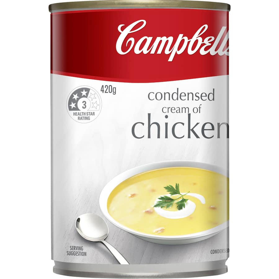 A can of Campbell's Cream of Chicken Soup, rich and creamy, perfect for quick meals and versatile recipes.