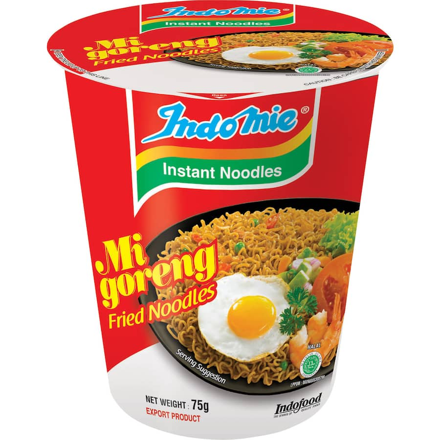 Indomie Instant Noodles Cup Mi Goreng with aromatic spices, tender noodles, and fork for a quick, flavorful meal on the go.