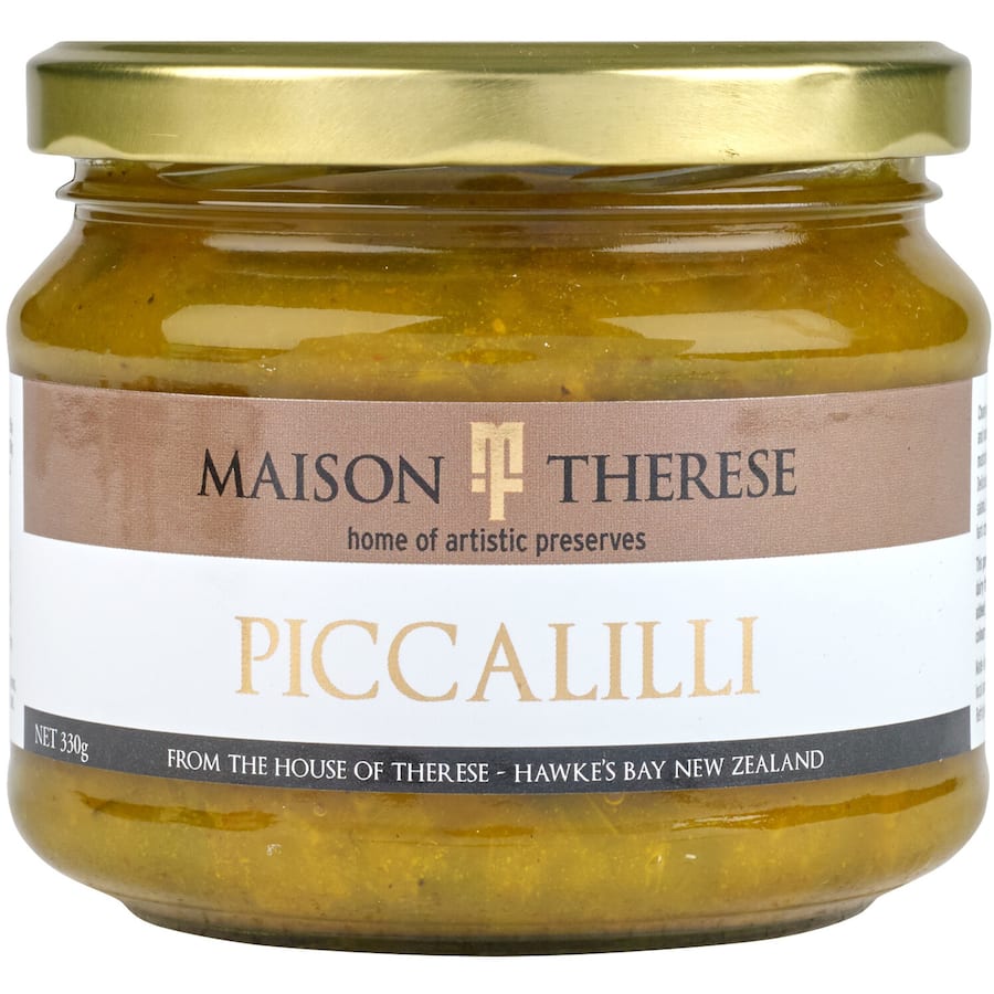 Maison Therese Piccalilli: chunky cauliflower, gherkins, and onions in mustard-turmeric sauce, perfect for meats and cheeses.