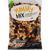 A colorful mix of crunchy peanuts, cashews, seeds, dried fruits, yogurt-coated sultanas, and chocolate bits.