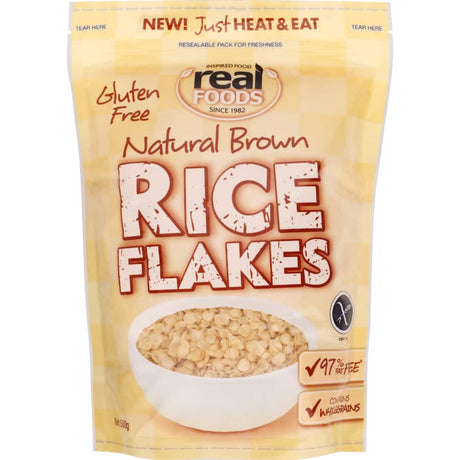 Crisp gluten-free rice flakes from Real Foods, perfect for nutritious breakfasts and versatile meal options.