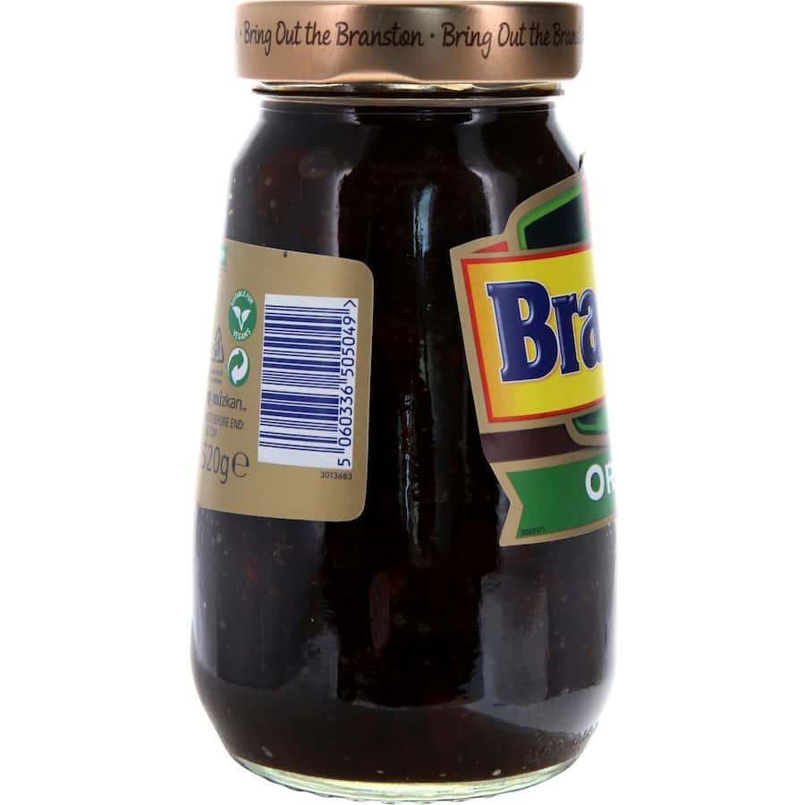 A jar of Branston Pickle Original, a tangy British condiment made with vegetables, vinegar, and spices for sandwiches and cheese.