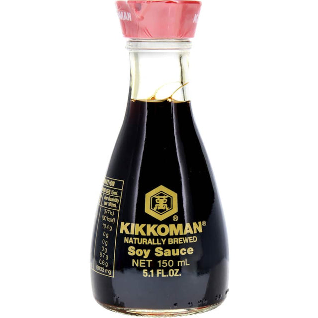 Kikkoman Soy Sauce in a drip-free dispenser, enhancing dishes with rich umami flavor, naturally brewed with no additives.