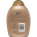 Sulfate-free OGX Brazilian Keratin Therapy Shampoo smooths and strengthens curly or wavy hair, enhancing shine and manageability.