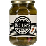 Crunchy McClures Gherkins Spicy Pickles, bursting with heat and flavor, perfect for snacking or enhancing meals.