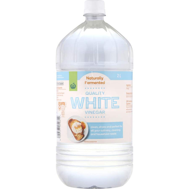 Woolworths White Vinegar bottle for cooking, cleaning, and eco-friendly household use, perfect for pickling and odor removal.