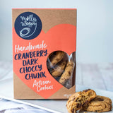 Molly Woppy Biscuits with cranberry and dark chocolate chunks, offering a delightful crunchy and indulgent snack experience.