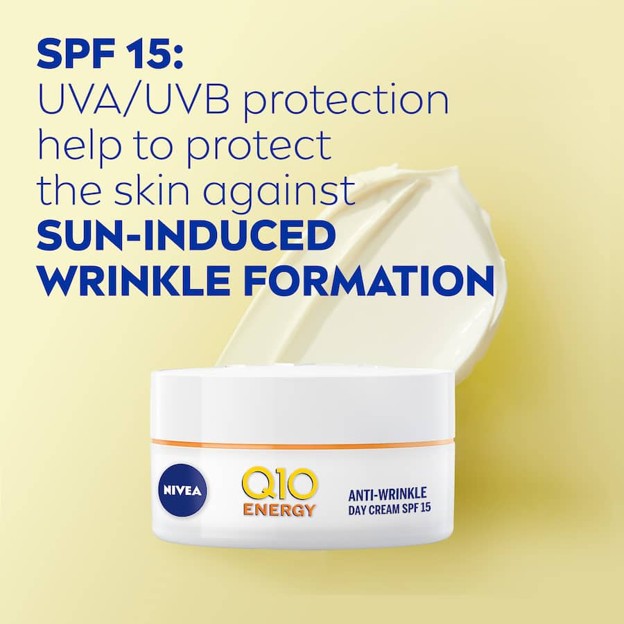 Nivea Q10 Plus C Day Cream SPF 15 for youthful skin, hydrates, fights wrinkles, and offers UVA/UVB protection.