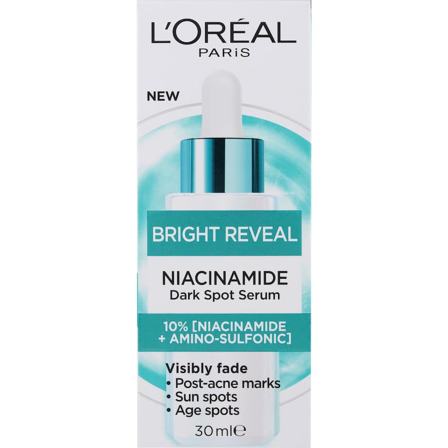 L'Oreal Bright Reveal Dark Spot Serum with Niacinamide and Amino-Sulfonic Acid, targeting and fading dark spots effectively.