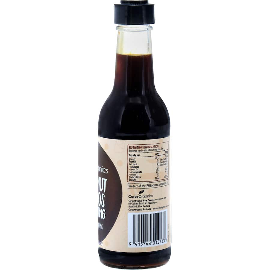 Ceres Organics Amino Sauce in a bottle, showcasing organic coconut sap, herbs, and spices for a soy sauce alternative.