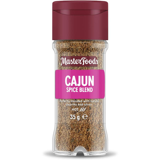 Masterfoods Cajun Seasoning in a glass shaker, featuring paprika, basil, chili, and fennel for flavorful cooking.