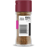 A glass shaker jar of Masterfoods Cajun Seasoning Blend, featuring spices like paprika and chili for flavorful dishes.