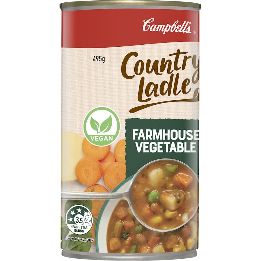 Canned Campbell's Country Ladle Farmhouse Vegetable Soup, featuring fresh vegetables, grains, and low calories, 99% fat-free.