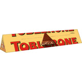 Toblerone Chocolate Block Original featuring triangular milk chocolate with honey and almond nougat, perfect for gifting or sharing.