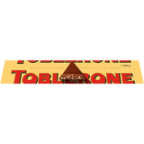 Toblerone Chocolate Block Original features iconic triangular pieces of Swiss milk chocolate with honey and almond nougat.