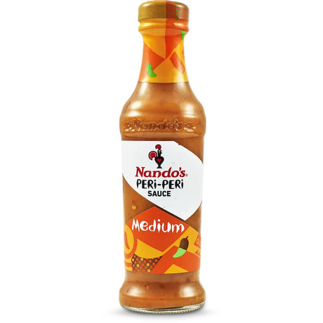 Nando's Peri Peri Sauce Medium: a flavorful blend of spices and tang, ideal for marinating, dipping, and enhancing meals.