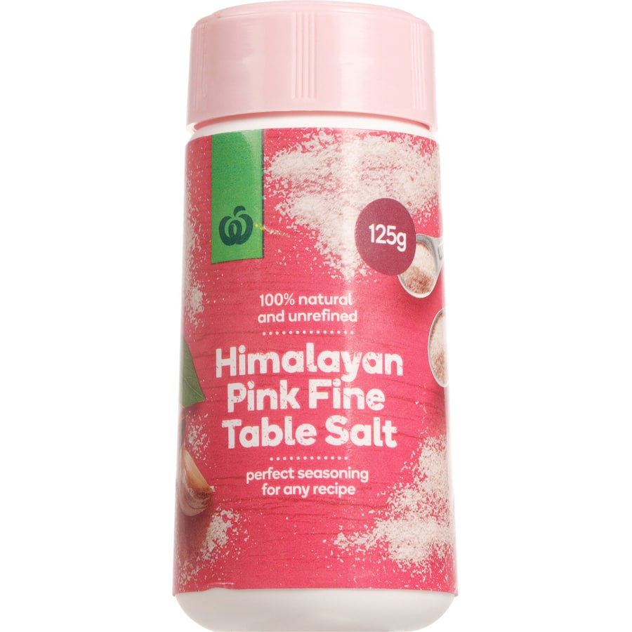 Fine cut Himalayan pink salt from Woolworths, 100% natural seasoning ideal for enhancing flavors in any dish.