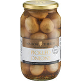 Maison Therese Pickled Onions in a jar, showcasing zesty flavor from New Zealand onions and spices for culinary versatility.