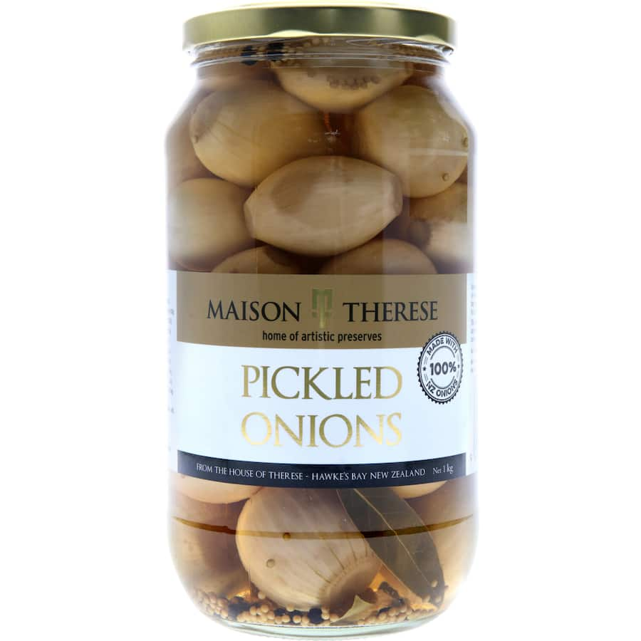 Maison Therese Pickled Onions in a jar, featuring vibrant onions infused with spices and vinegar for a zesty culinary enhancement.