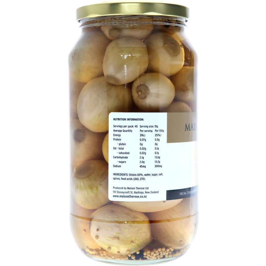 Maison Therese Pickled Onions in a jar, showcasing vibrant onions in a spicy vinegar mix, perfect for culinary dishes.