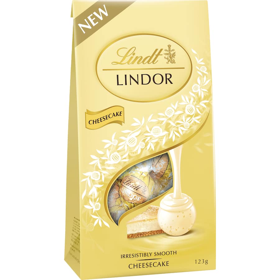 Lindt Lindor Chocolates Cheesecake with white chocolate shell and creamy cheesecake center, infused with a hint of lemon.