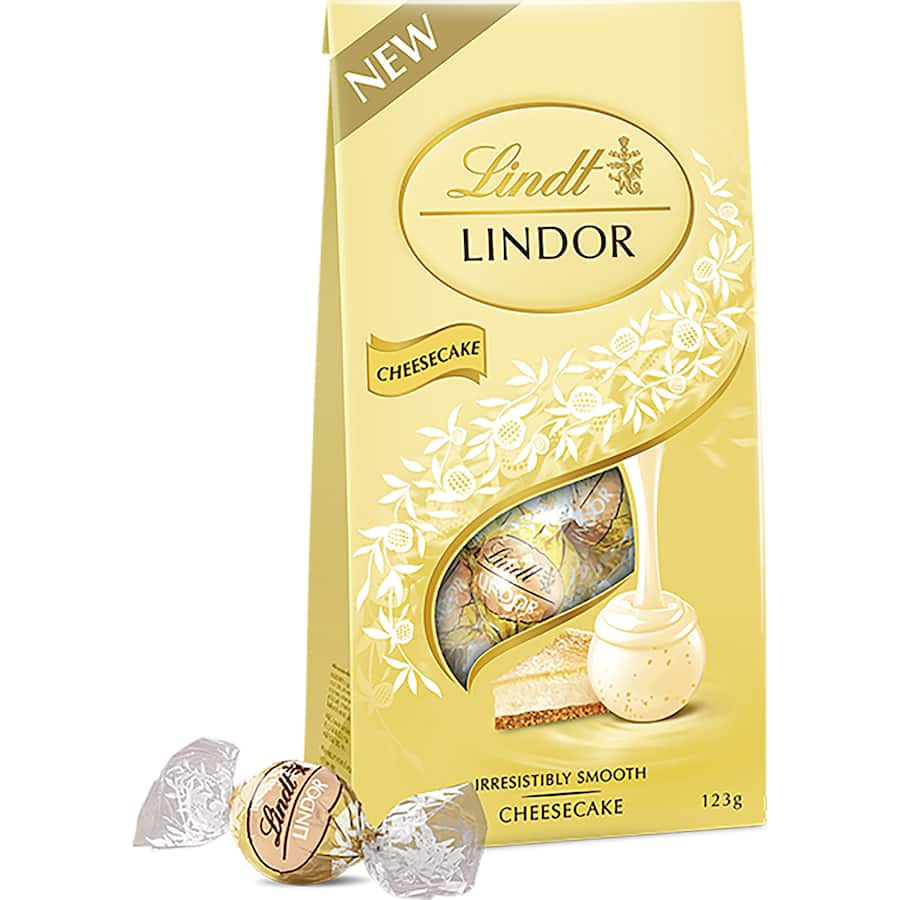 A luscious cheesecake encased in a white chocolate shell, infused with lemon for a perfect balance of sweetness and tartness.