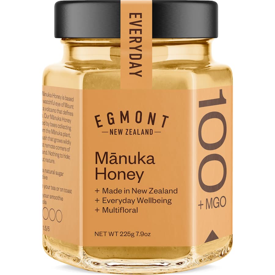 Egmont Manuka Honey Mgo 100+ in a jar, showcasing its rich golden color and premium quality from New Zealand's pristine lands.