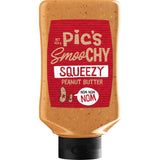 Smooth and crunchy peanut butter in a squeezy bottle, perfect for spreading or enjoying by the spoonful.