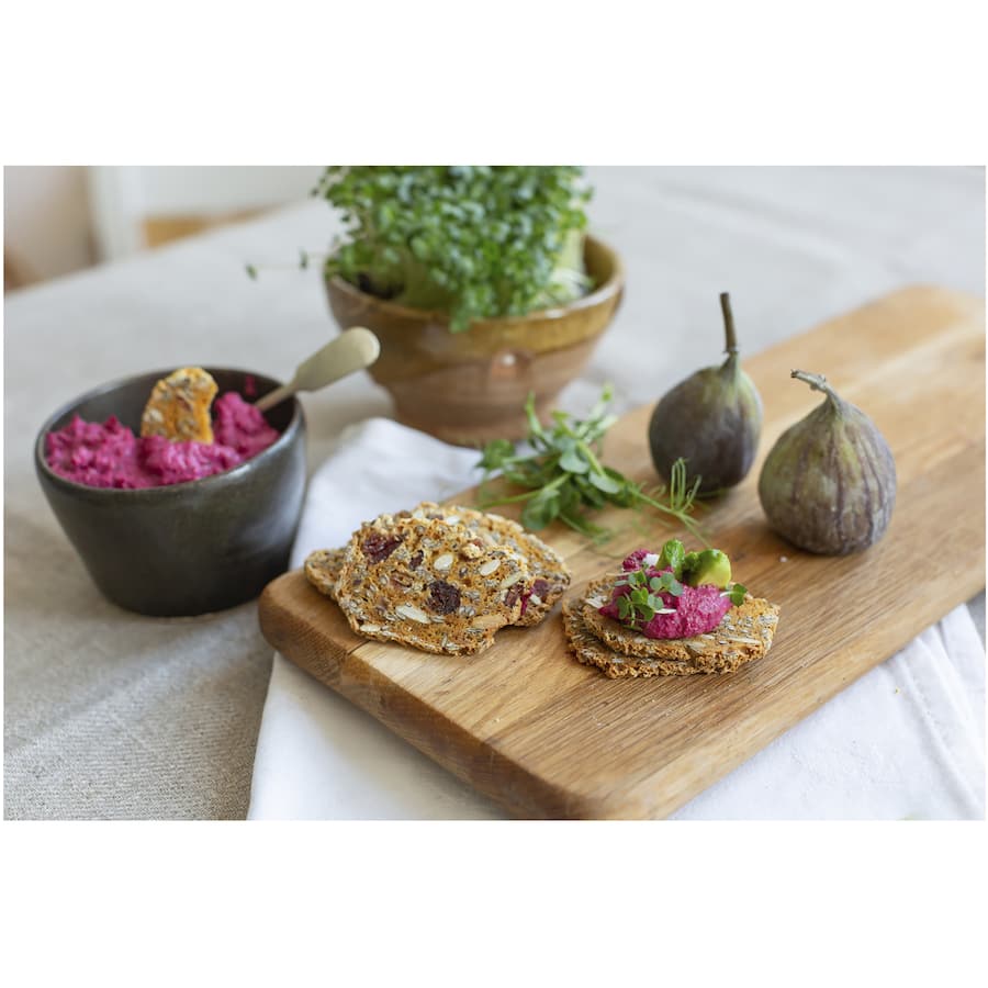 Artisan-crafted Ob Finest Crackers with cranberry and pumpkin, perfect for cheese pairings or solo snacking.