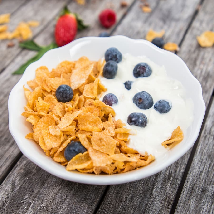 Kellogg's Corn Flakes: crisp, light corn flakes for a nutritious, gluten-free breakfast staple enjoyed with milk or toppings.