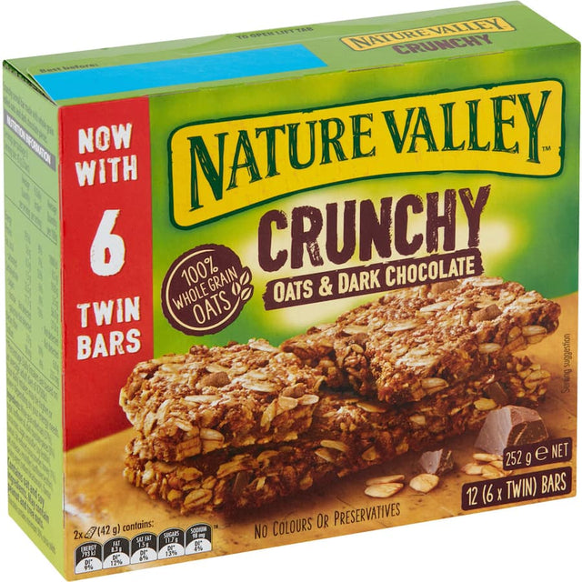 Nature Valley Crunchy Muesli Bars with oats and dark chocolate, offering a wholesome, crunchy snack rich in fiber, perfect for on-the-go.