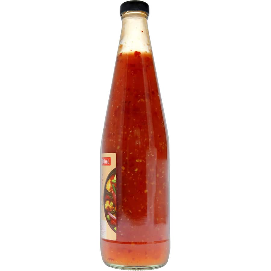 Woolworths Chilli Sauce bottle, a flavorful blend of red chilli and garlic, perfect for adding spice to any dish.