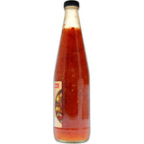 Woolworths Chilli Sauce bottle, a flavorful blend of red chilli and garlic, perfect for adding spice to any dish.