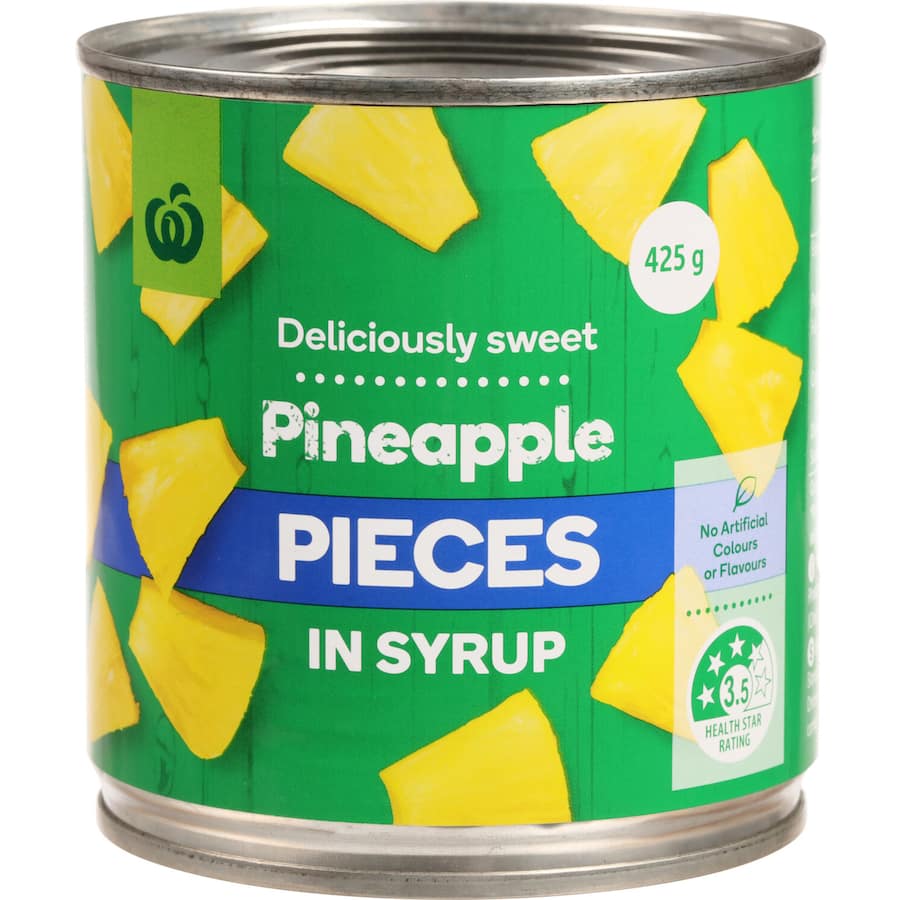 Canned pineapple pieces in syrup, perfect for desserts, fruit salads, and savory dishes, offering natural sweetness and tropical flavor.