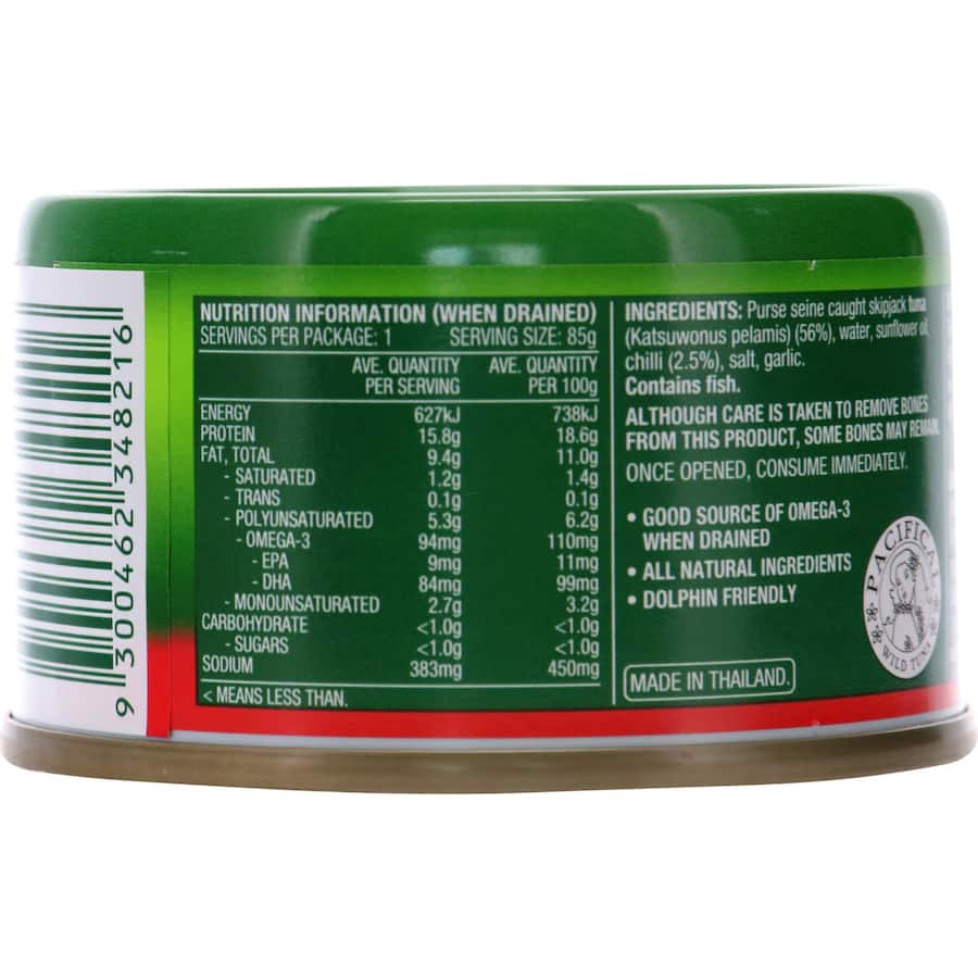 Flaked tuna in a can with whole red chilli, offering bold flavors and omega-3 nutrition for versatile meal options.
