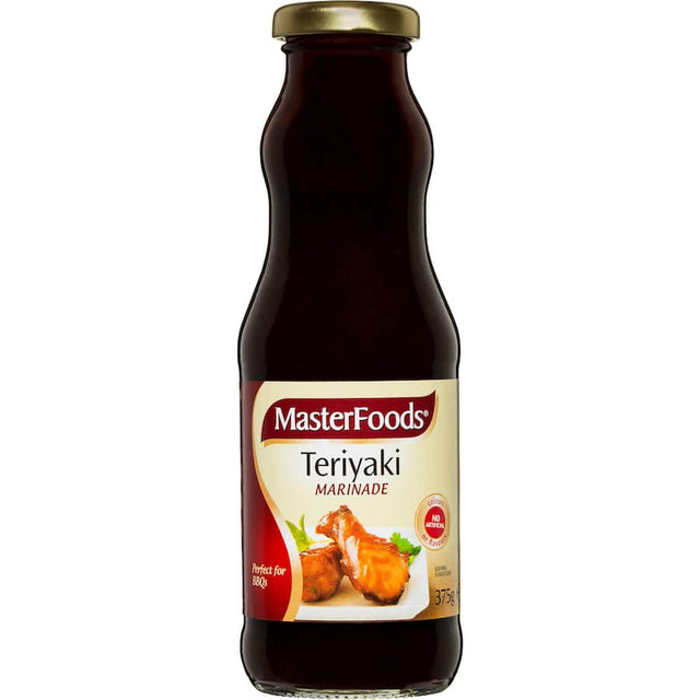 Masterfoods Marinade Teriyaki bottle showcasing a blend of sherry, sesame oil, garlic, and ginger for flavorful meals.