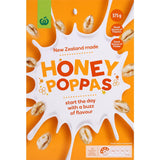 A box of Woolworths Cereal Honey Poppas featuring crispy honey-coated puffs, nutritious and suitable for the whole family.