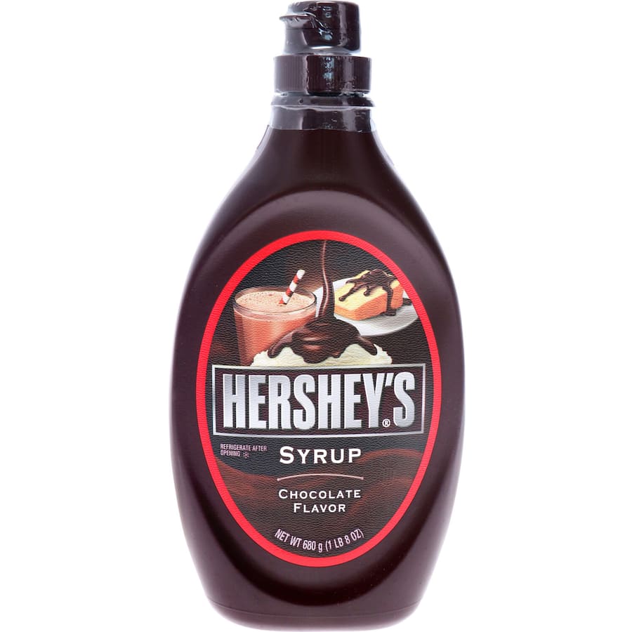 Rich and creamy Hershey's Topping Chocolate Syrup in a squeeze bottle, perfect for drizzling over ice cream and desserts.