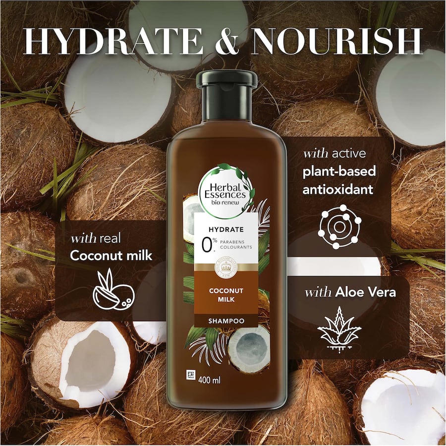 Hydrating shampoo with coconut milk for dry hair, infused with antioxidants and a vibrant floral scent, 400ml bottle.