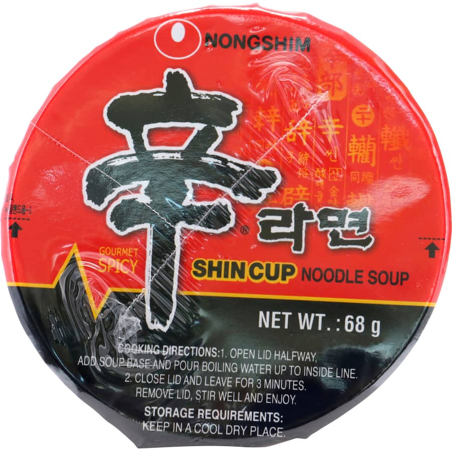 Nong Shim Shin Ramyun cup featuring spicy Korean noodles, savory beef broth, and vegetables for a quick, flavorful meal.