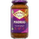 A jar of Patak's Madras Simmer Sauce, featuring a spicy tomato flavor for easy, authentic Indian curries in 20 minutes.