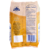 Chelsea Caster Sugar Raw in golden crystals, ideal for baking with a honey-like sweetness and easy dissolving properties.