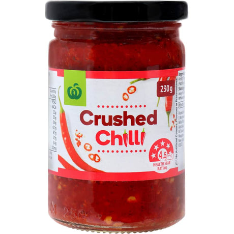 Woolworths Crushed Chilli jar showcasing natural chili flakes for enhancing dishes with robust heat and flavor.